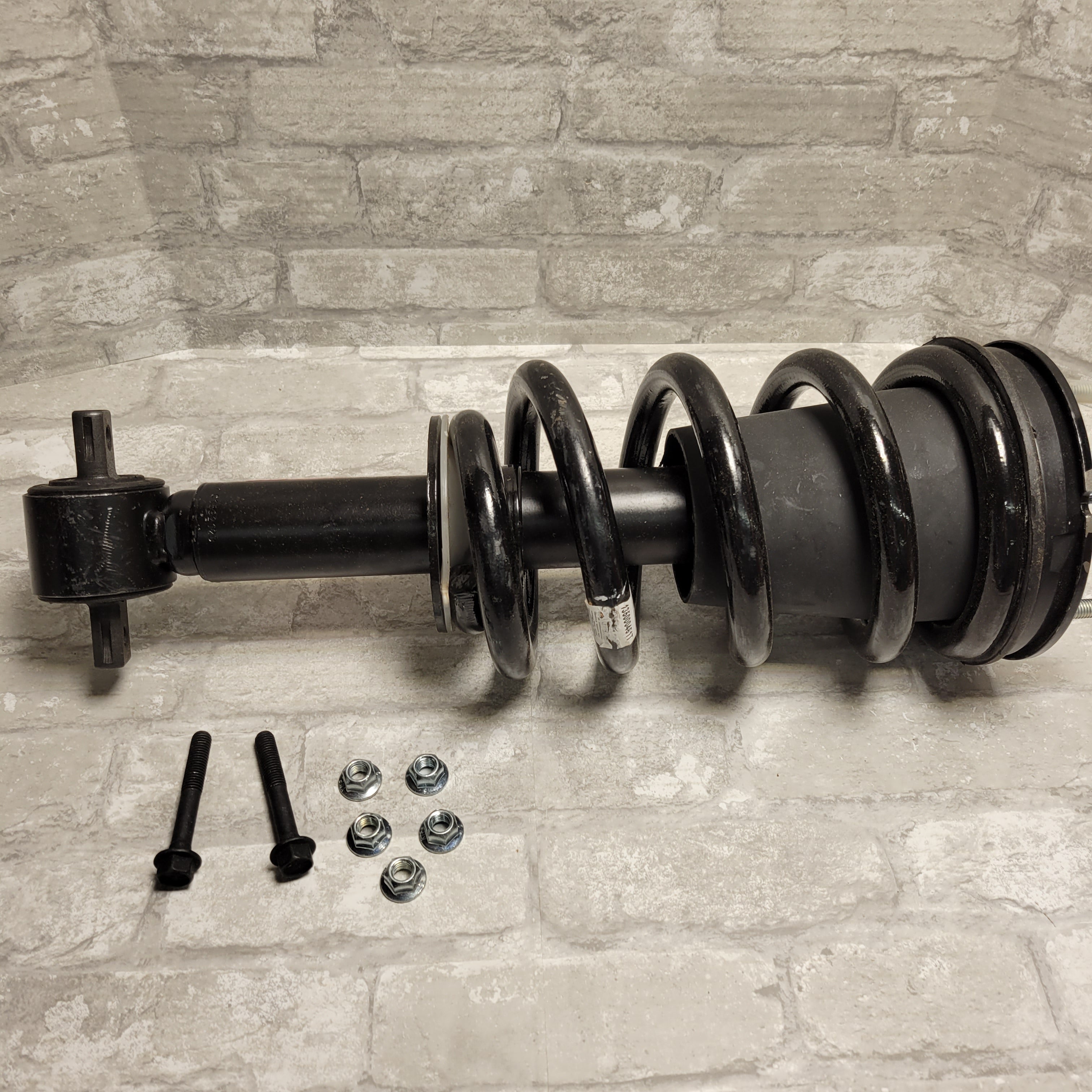 Monroe Shocks & Struts Quick-Strut 239112 Strut and Coil Spring Assembly (8048885956846)